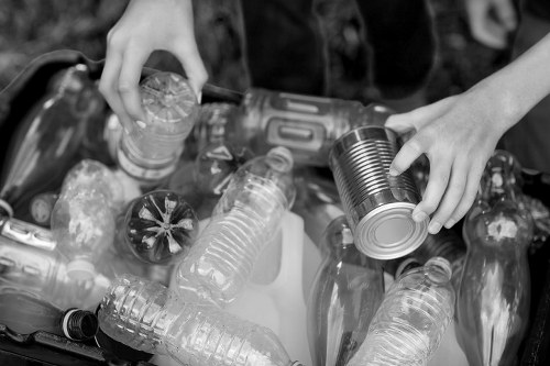 Workers sorting items during a house clearance in Elephant and Castle